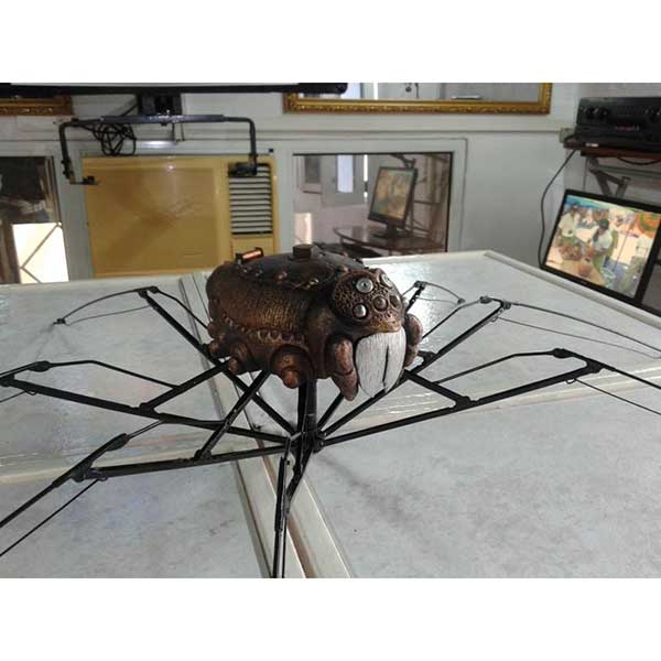 Fired ceramic with a patina, metal and painted eggshell - H 15 x D 65 cm