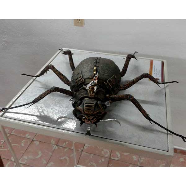 Fired ceramic with a patina, metal, painted eggshell and thorns- L 45 x W 45 x H 7 cm