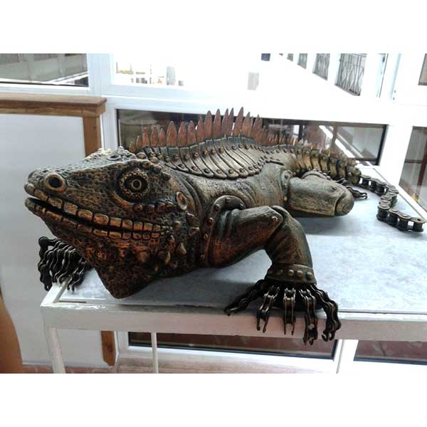 Fired ceramic with a patina, metal and painted eggshell - L 66 x W 34 x H 17 cm